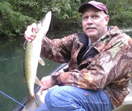 Angler with pickerel