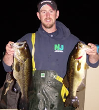 Author with two largemouth bass