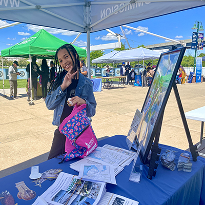 A Chester River Festival attendee stops by the DRBC table. Photo by the DRBC.