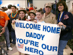 A family welcomes home their father