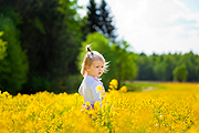 girl in a field of flowers