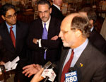Corzine speaks to the press at the New York Building Congress