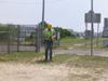 The contractor's surveyor is operating a One Man Total Station Robotic Instrument. 